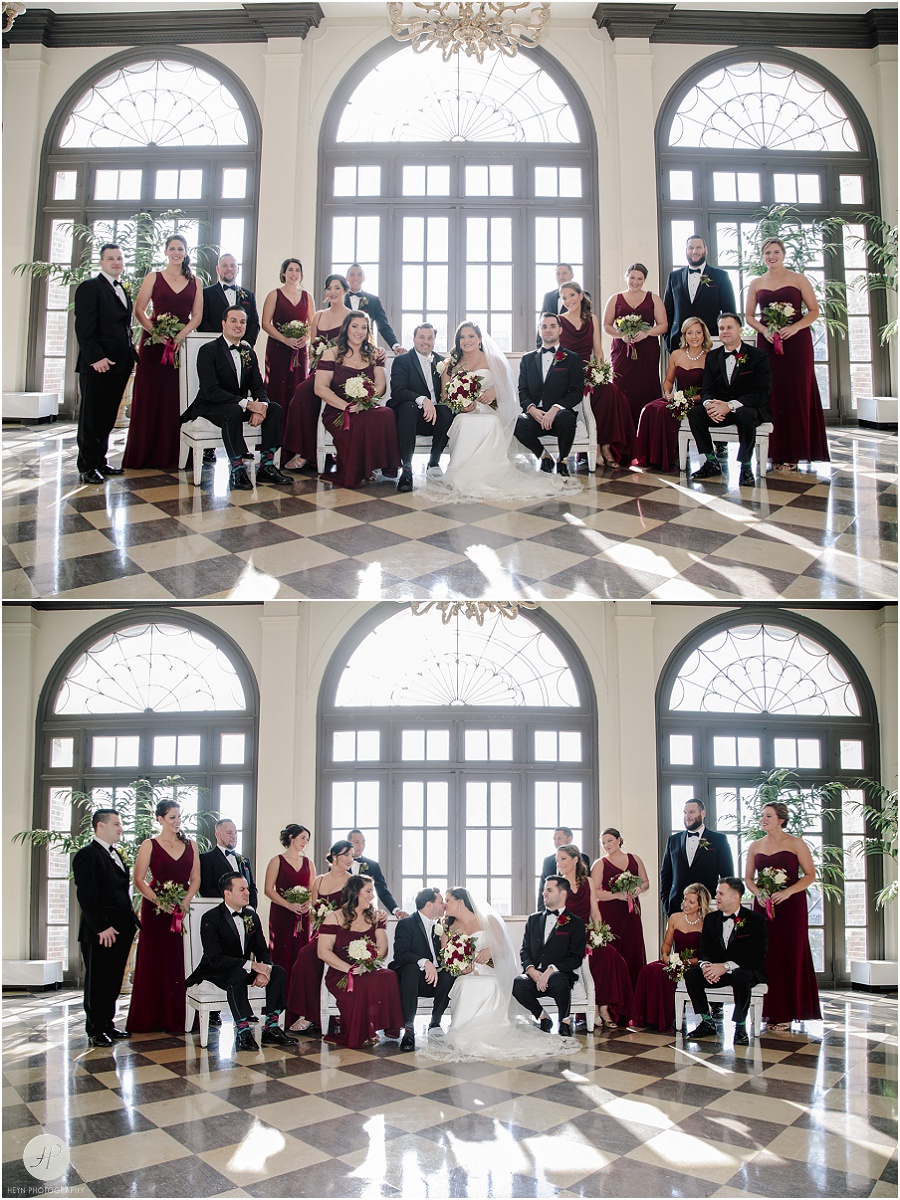 maroon and black bridal party in front of large window in modern lobby at  berkeley oceanfront hotel in asbury park 