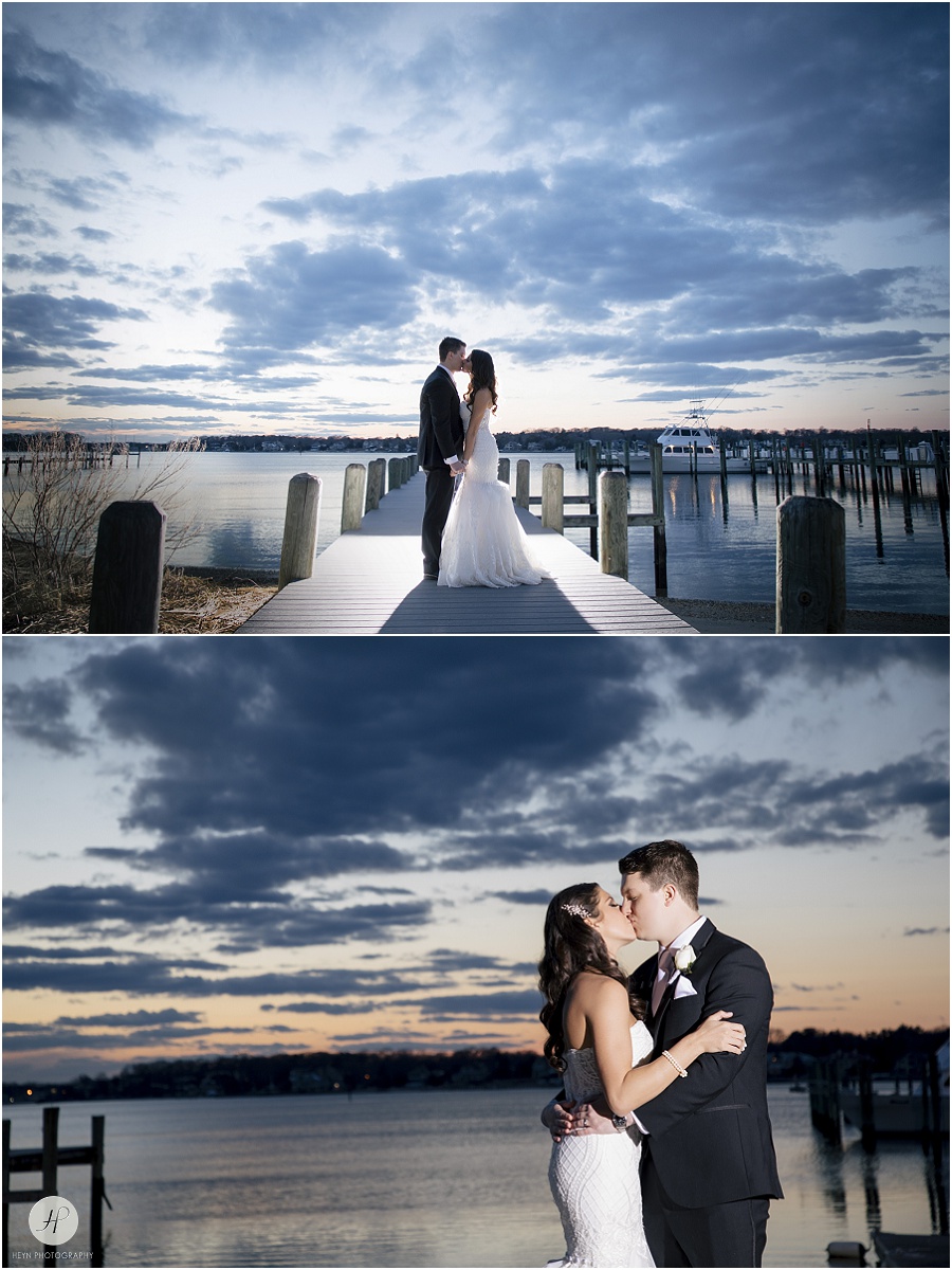 bride and groom at sunset on dock at clarks landing yacht club wedding