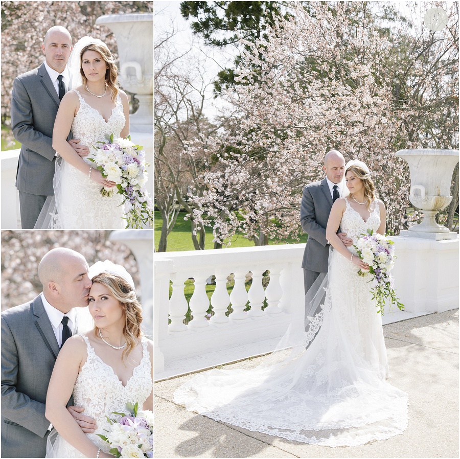 bride and groom with cherry blossoms outside Monmouth University Library wedding photography