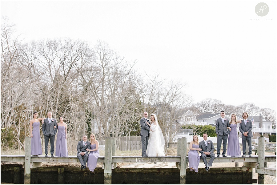 bridal party on dock at Clarks Landing Yacht Club wedding in point pleasant nj