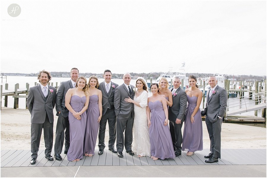 bridal party on pier at Clarks Landing Yacht Club wedding in point pleasant nj