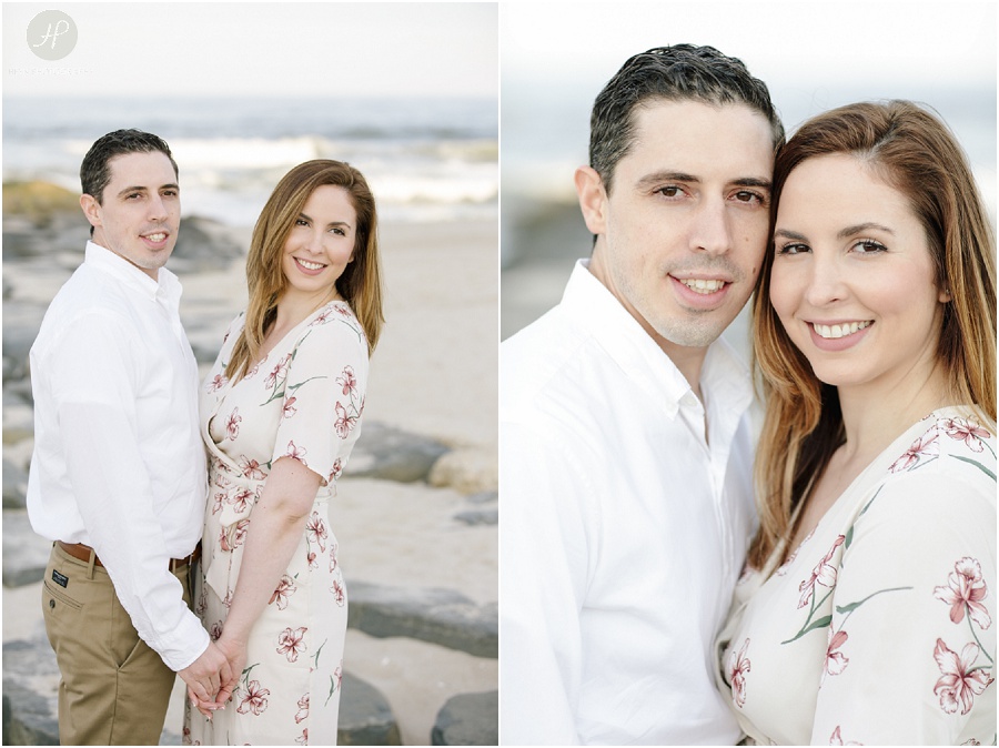 couple smiling on beach at spring lake engagement session in new jersey 
