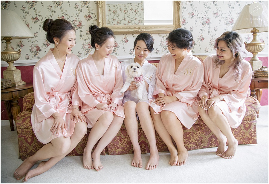 bridesmaids in robe with dog getting ready for backyard wedding new jersey 