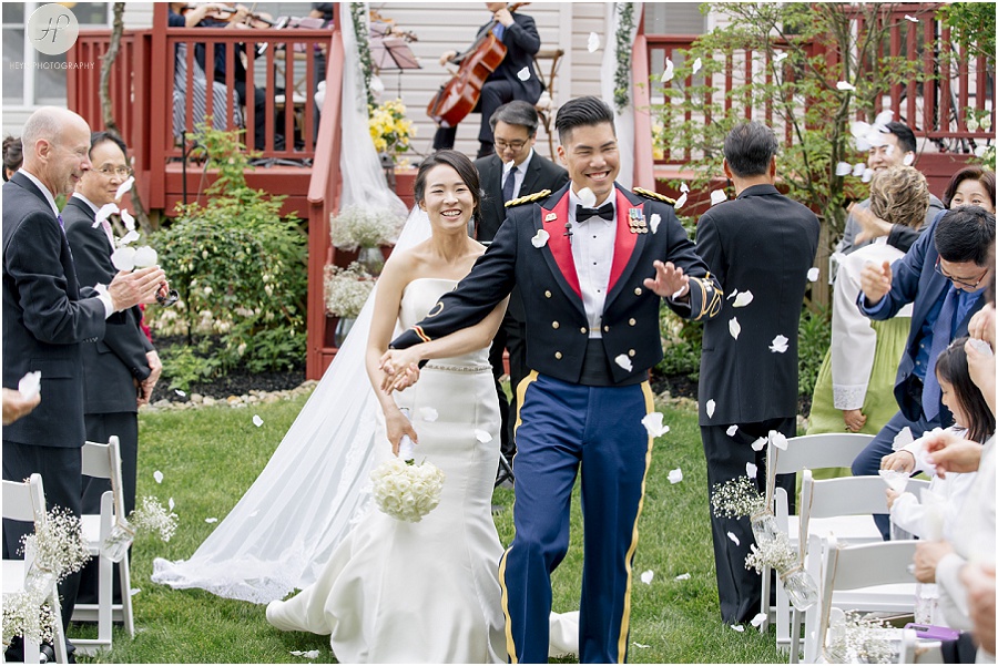bride and groom walking down aisle at backyard wedding ceremony in new jersey 