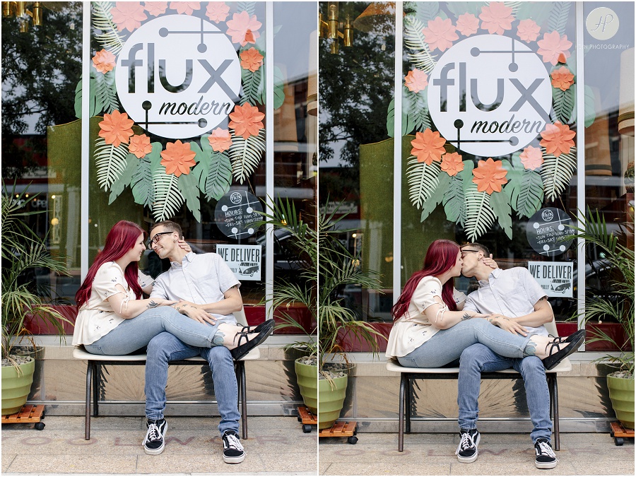 engaged couple in front of cafe at downtown asbury park engagement session 