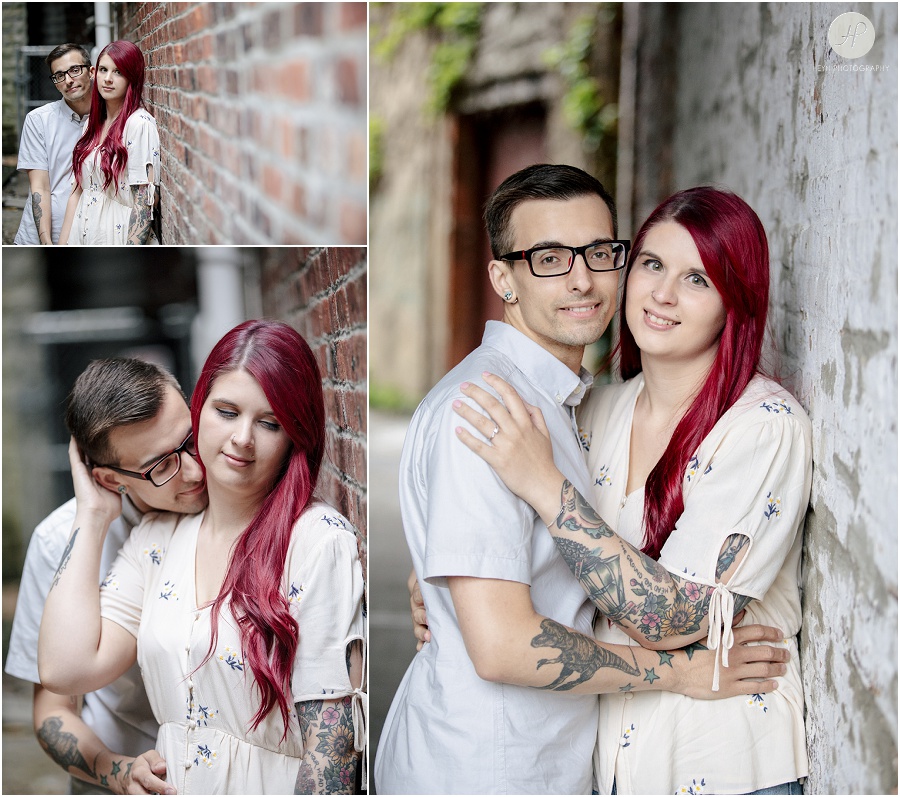 engaged couple in alley at downtown asbury park engagement session 