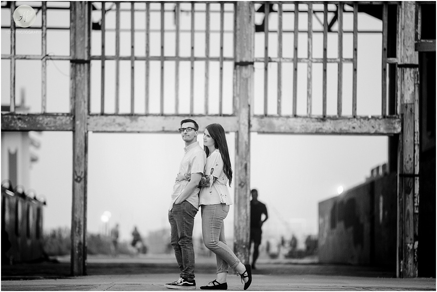 black and white of engaged in front of casino at downtown asbury park engagement session 