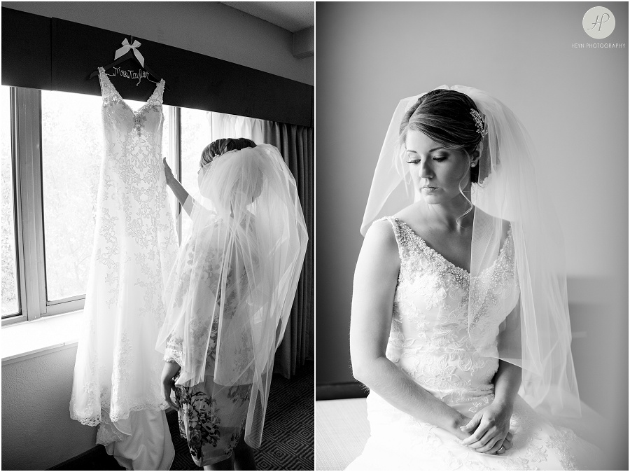 black and white of bride and her dress at clarks landing wedding 