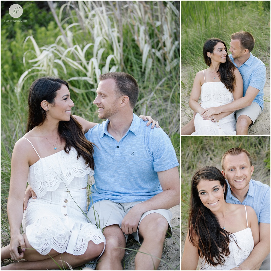 engaged couple sitting on beach during sunset in manasquan beach engagement shoot