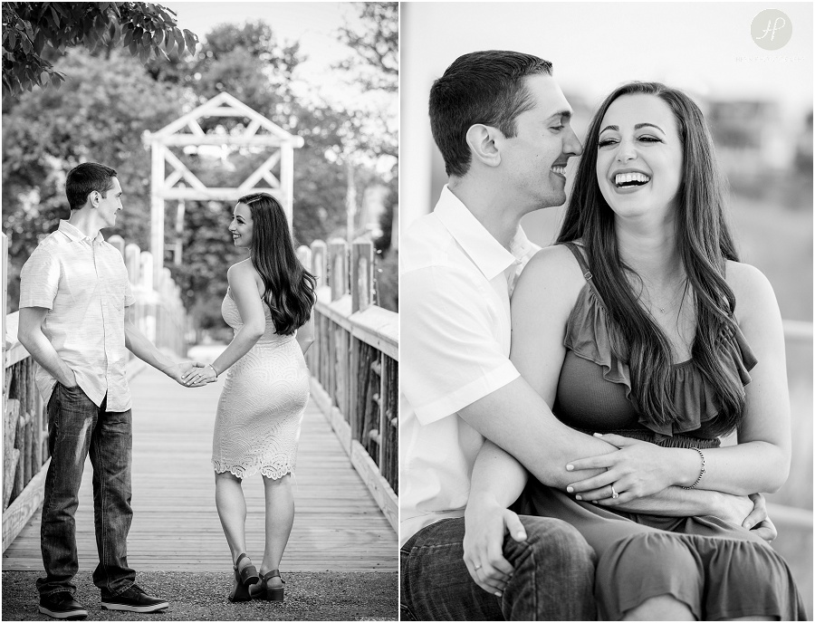 black and white of engaged couple holding hands in park in spring lake engagement session