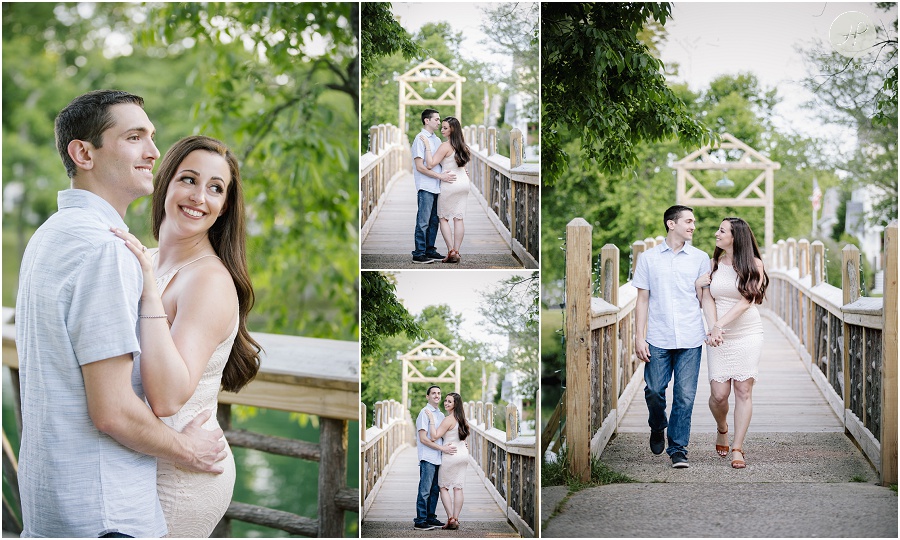 engaged couple holding hands in park in spring lake engagement session