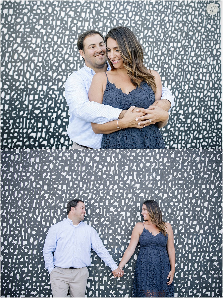 couple on boardwalk at asbury park engagement session 