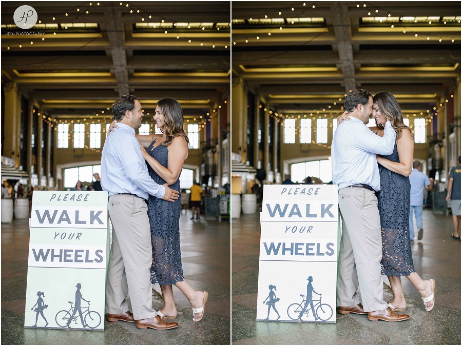 couple on boardwalk by convention center at asbury park engagement session 