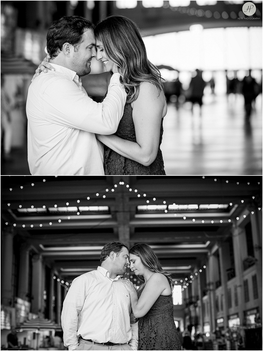 black and white of couple on boardwalk by convention center at asbury park engagement session 