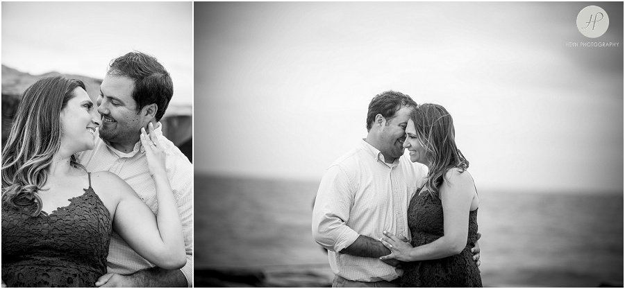 couple on beach on jetty at asbury park engagement session 