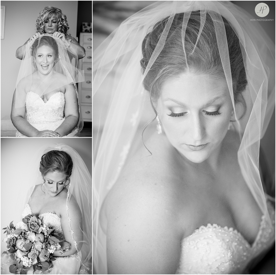 black and white of bride getting ready at clarks landing yacht club wedding 