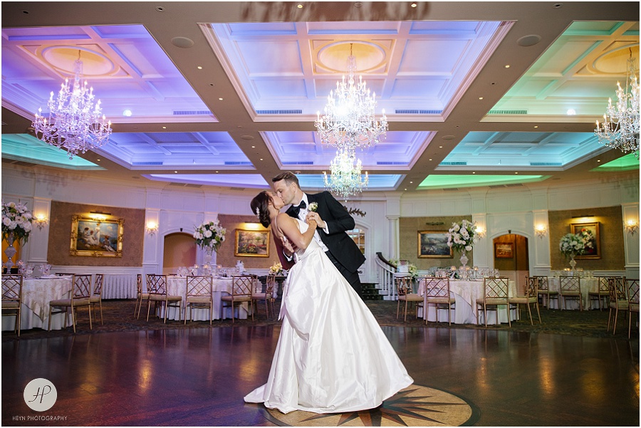 bride and groom in ballroom at clarks landing yacht club wedding