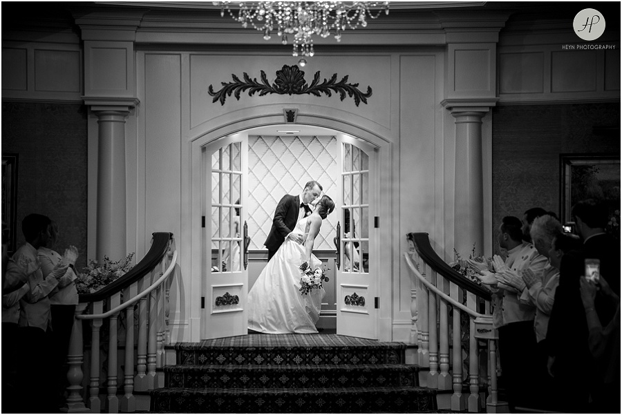 black and white bride and groom in ballroom at clarks landing yacht club wedding