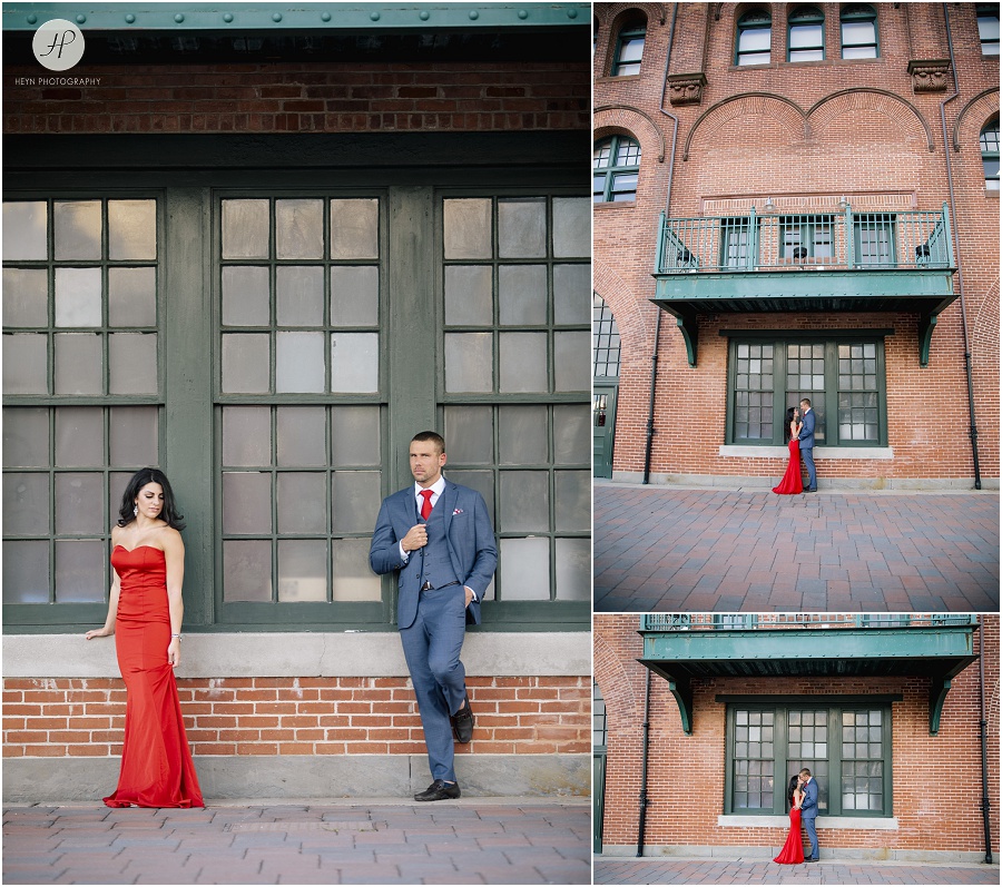 couple by old clock tower in liberty state park engagement session jersey city