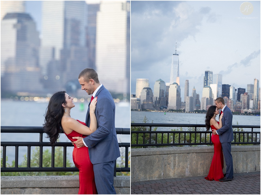 couple by new york city skyline in liberty state park engagement session jersey city