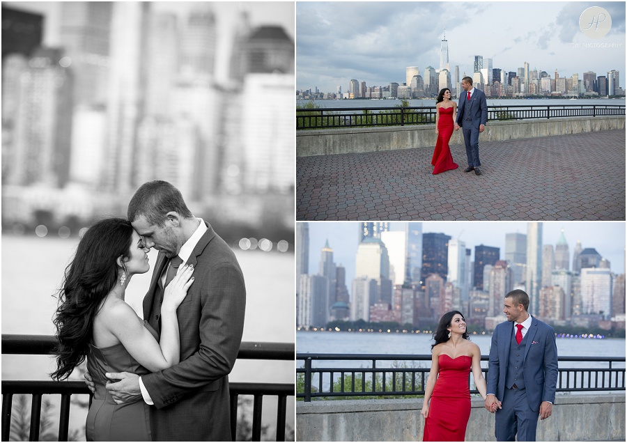 couple by new york city skyline in liberty state park engagement session jersey city