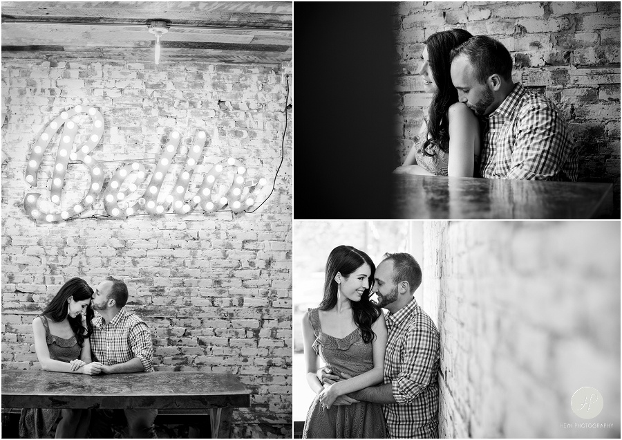 black and white of couple at restaurant in downtown Princeton university engagement session