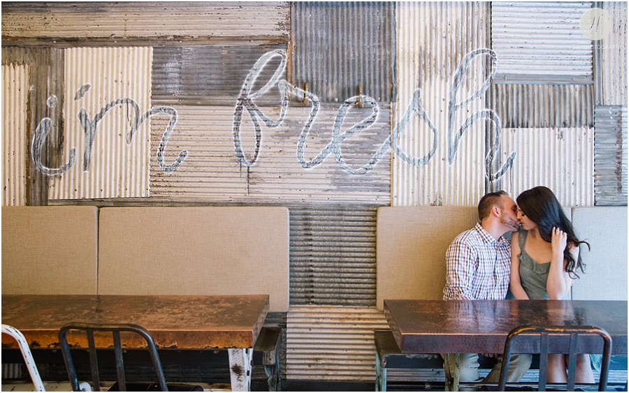 couple at restaurant in downtown Princeton university engagement session