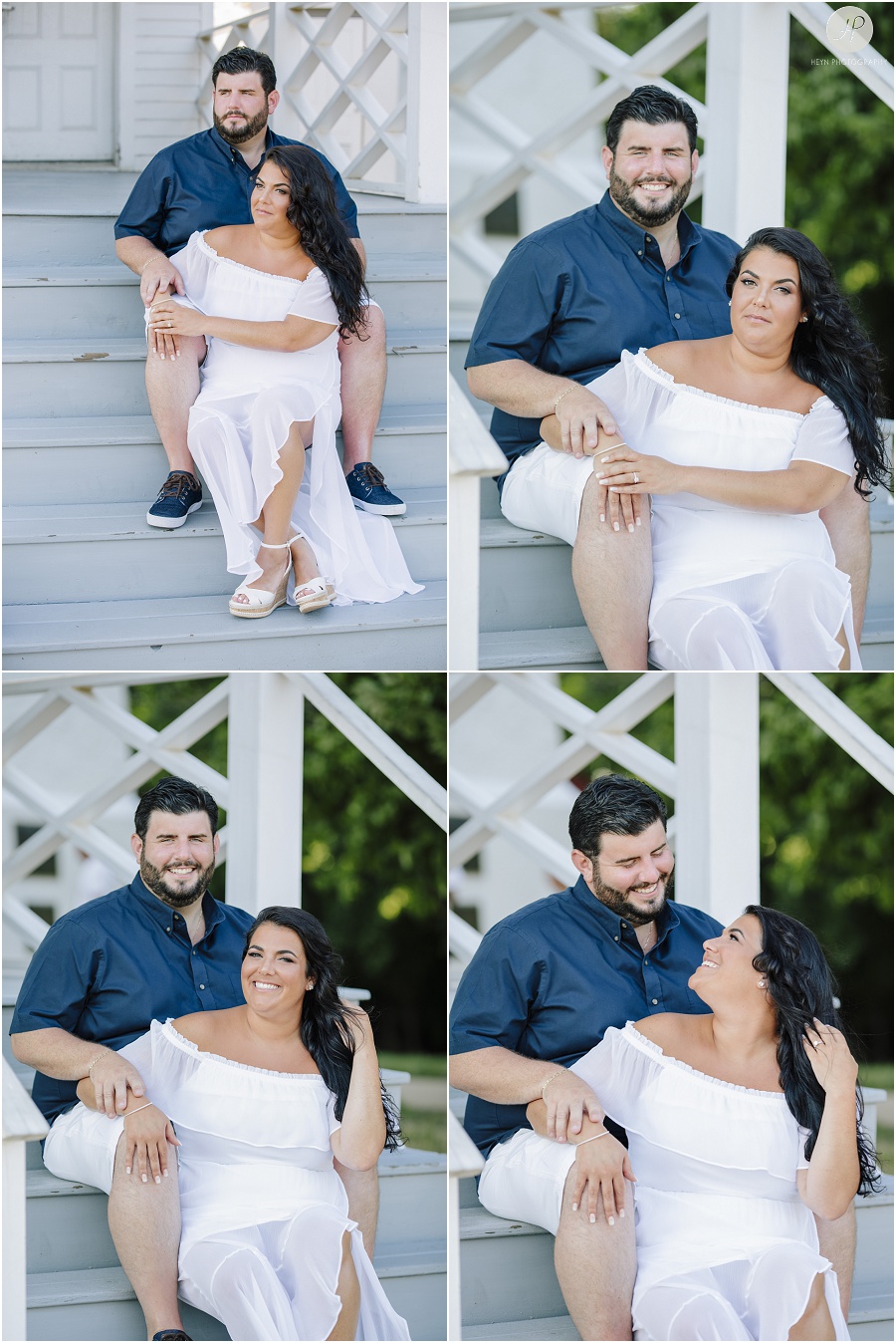 couple on steps of light house at sandy hook engagement session