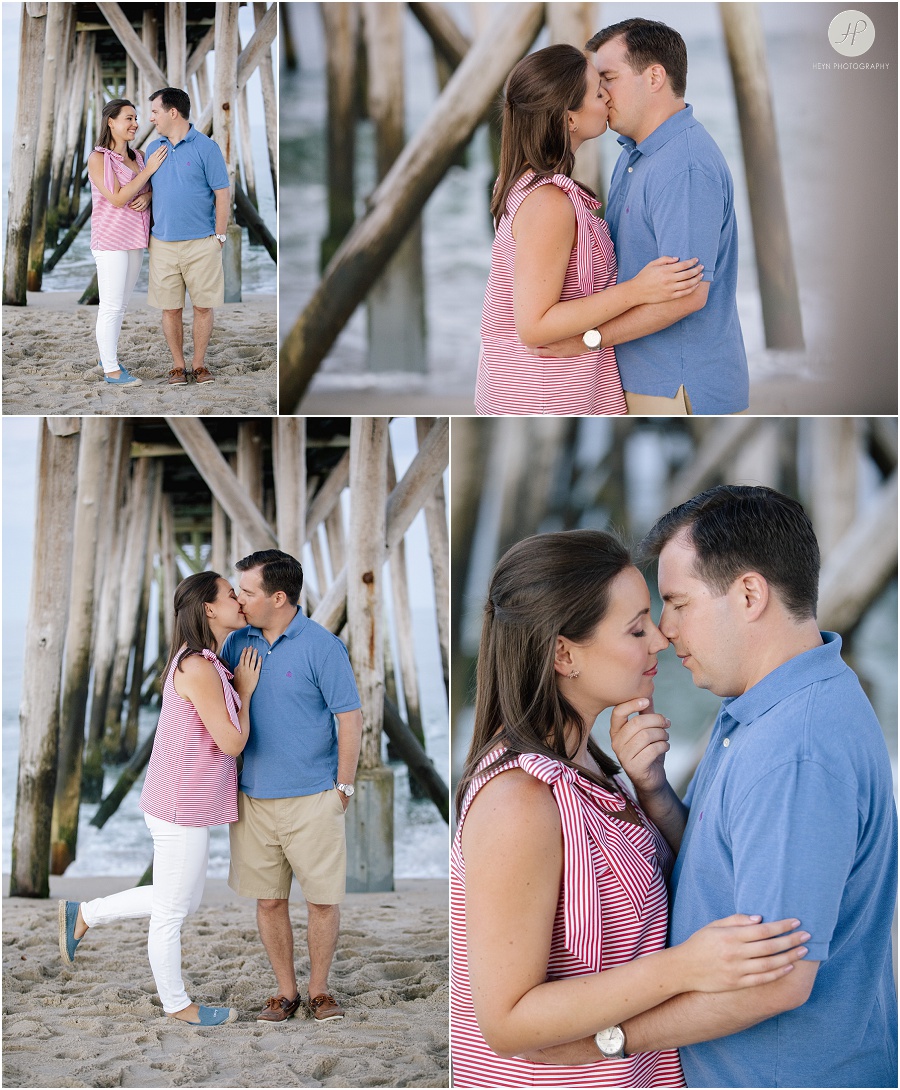 couple under pier in belmar beach at spring lake engagement session