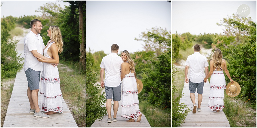 couple on boardwalk on long beach island engagement session