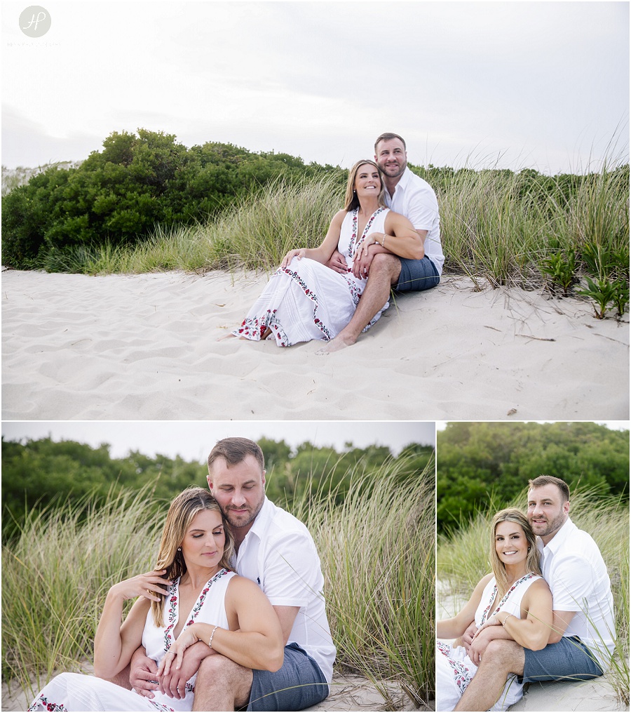 couple sitting on sand on long beach island engagement session