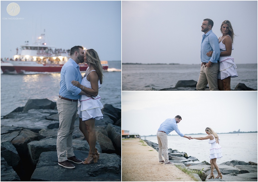  engaged couple in on jetty at night on long beach island engagement session
