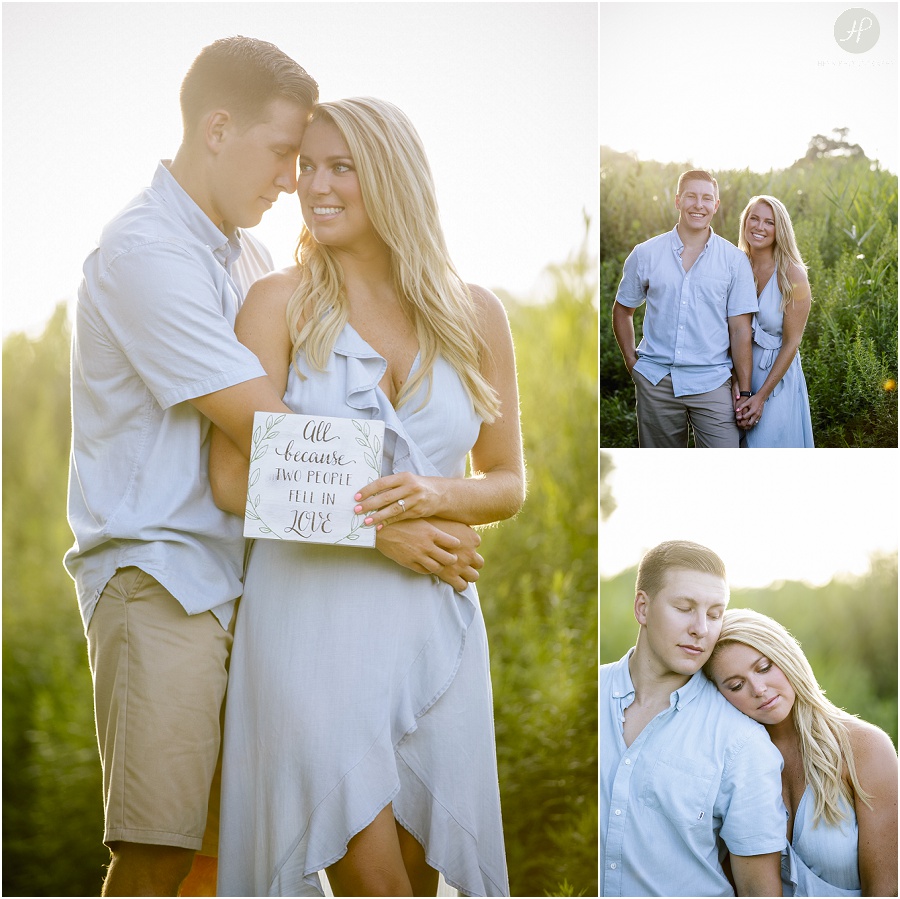 couple in grass near beach at manasquan engagement session 