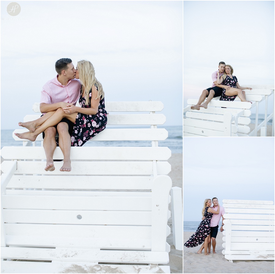 couple on life guard stand beach at manasquan engagement session