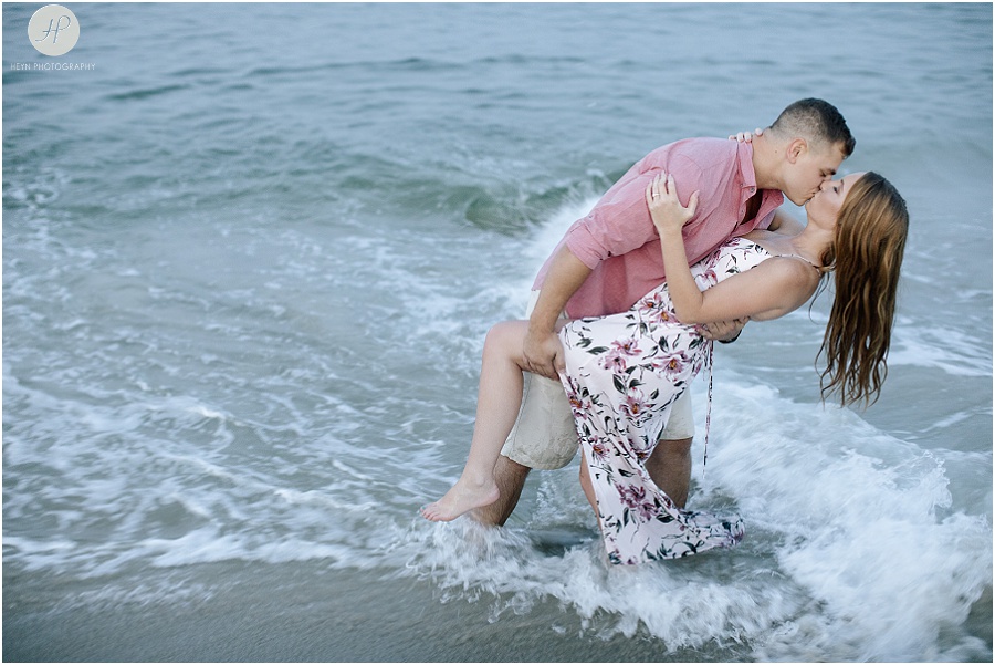 engaged couple on manasquan beach engagement 