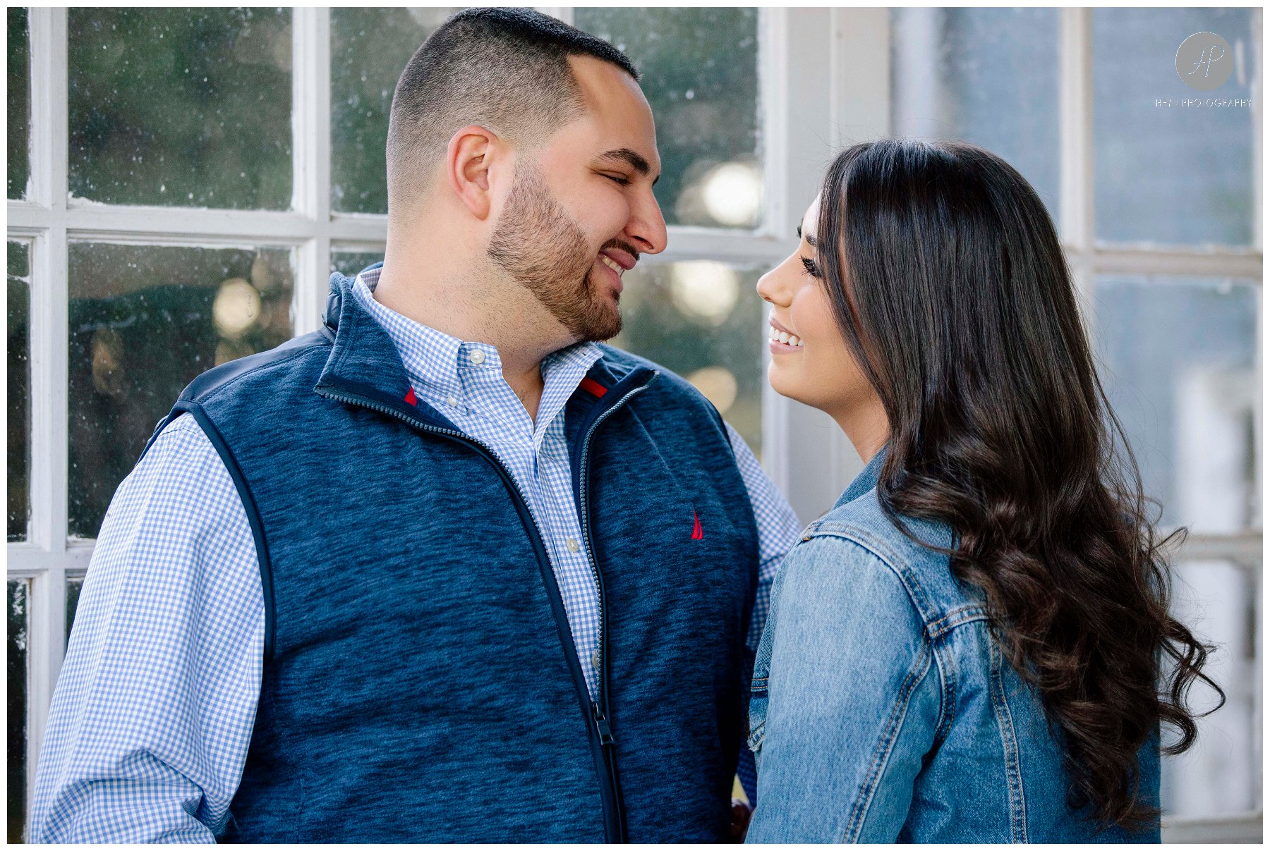 couple outside on porch for Bayonet Farm engagement session in new jersey 