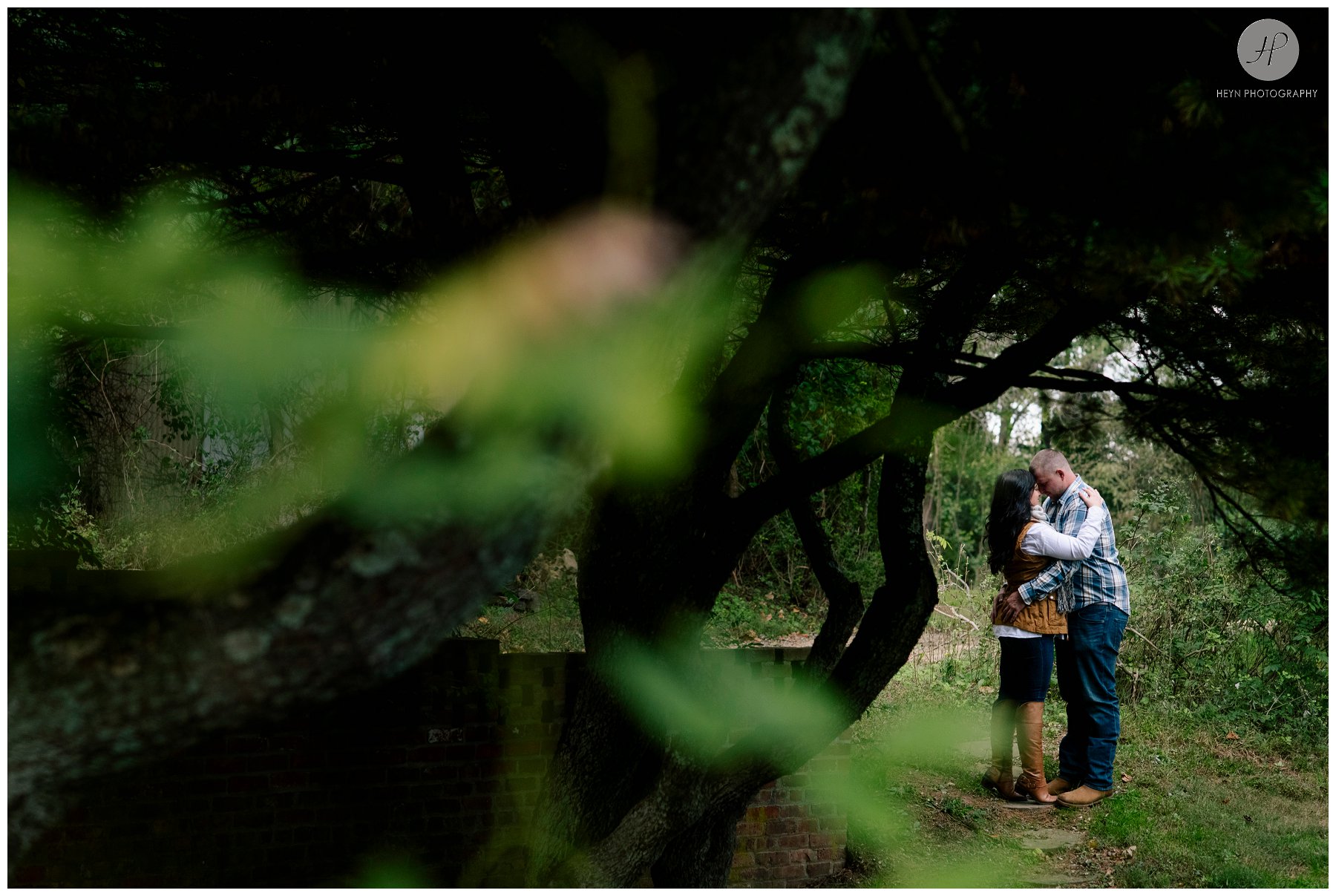  couple in woods at bayonet farm engagement session in new jersey