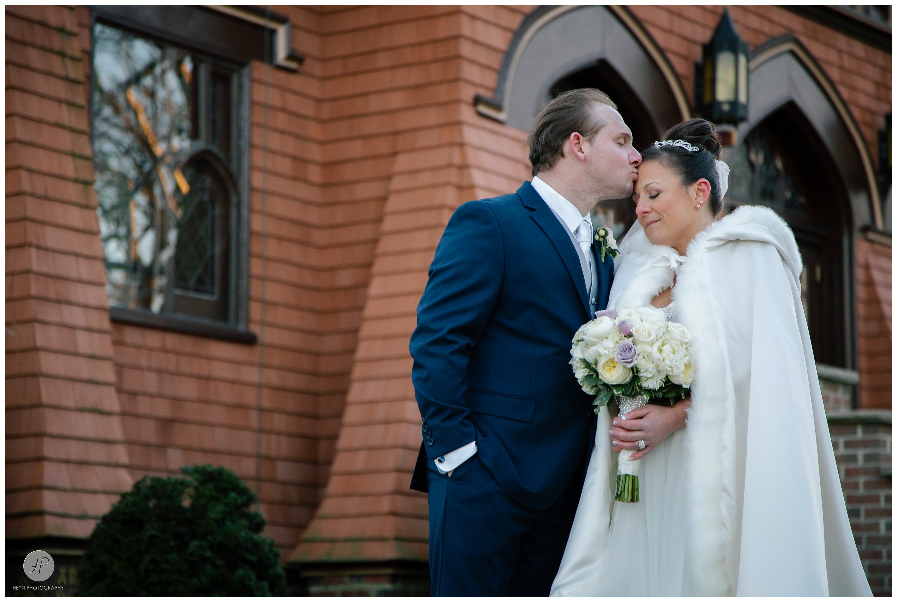 bride and groom outside saint peter's church in point pleasant new jersey