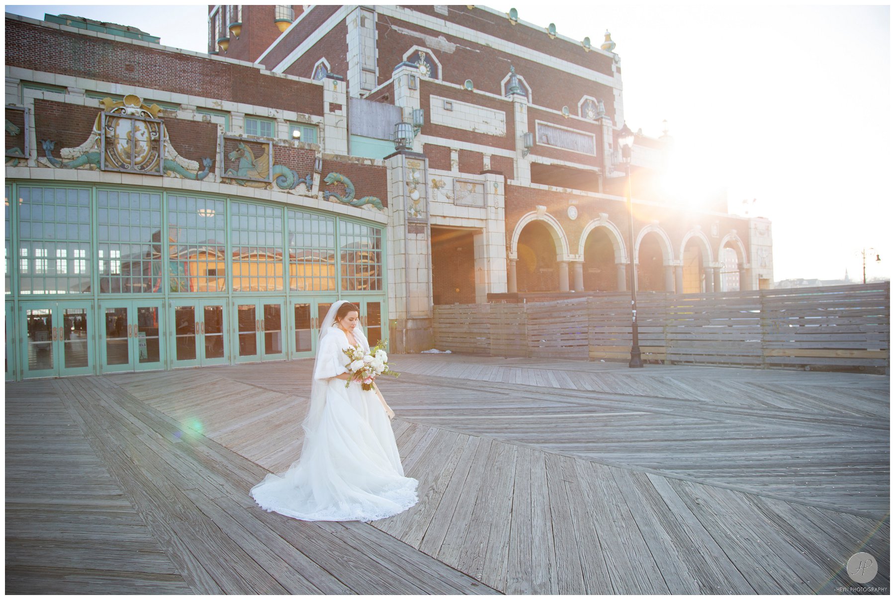 wedding photos of bride outside convention hall in asbury park nj