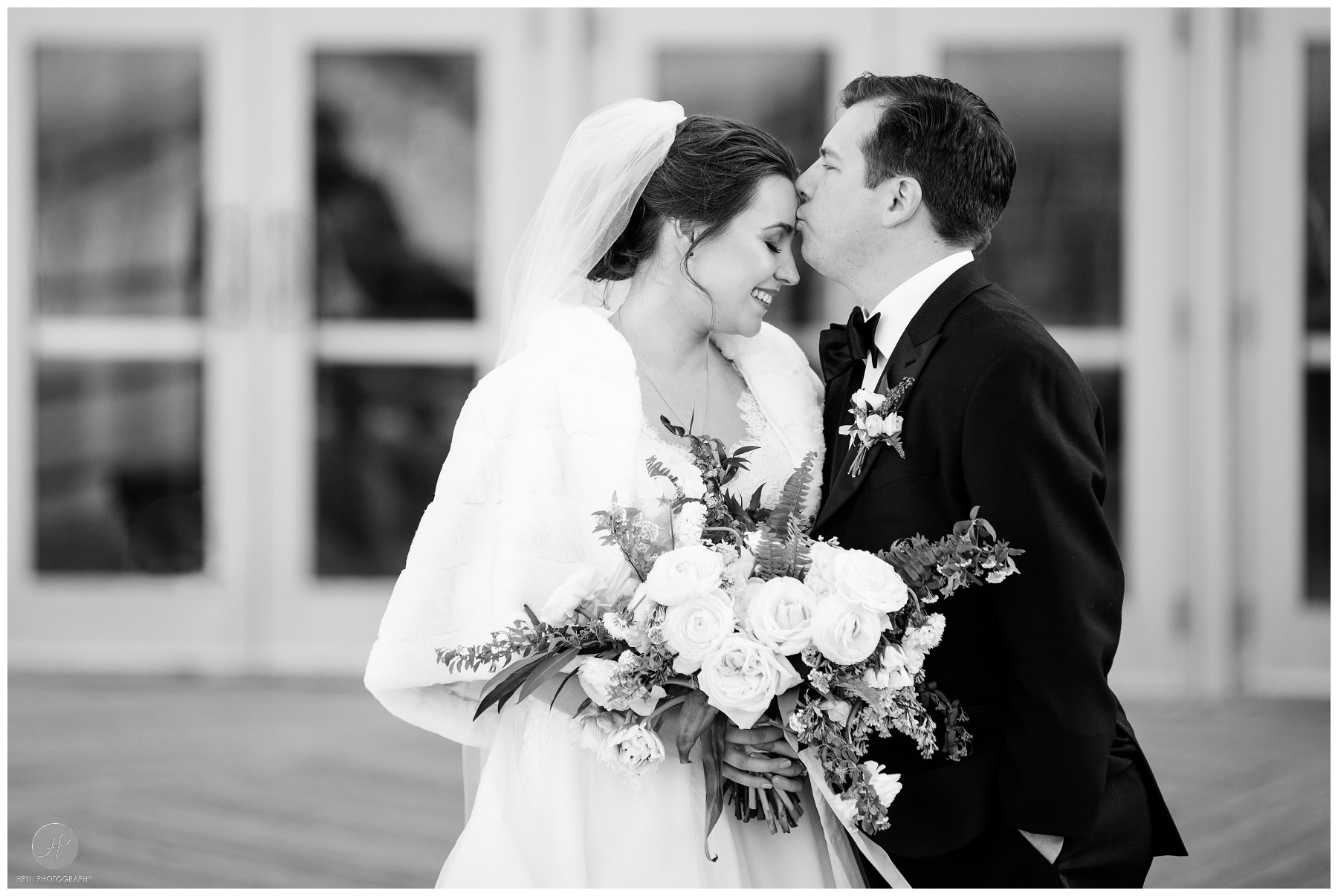 wedding photos of bride and groom outside convention hall in asbury park nj