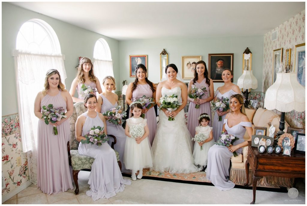 bride and bridesmaids in childhood home