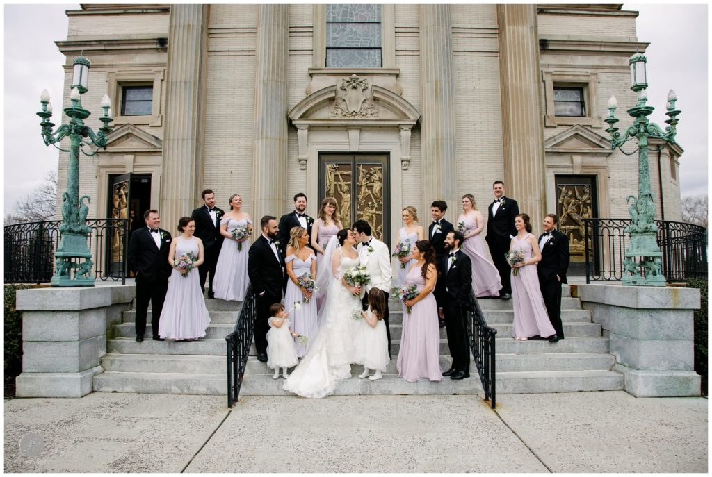 bridal party on church stairs