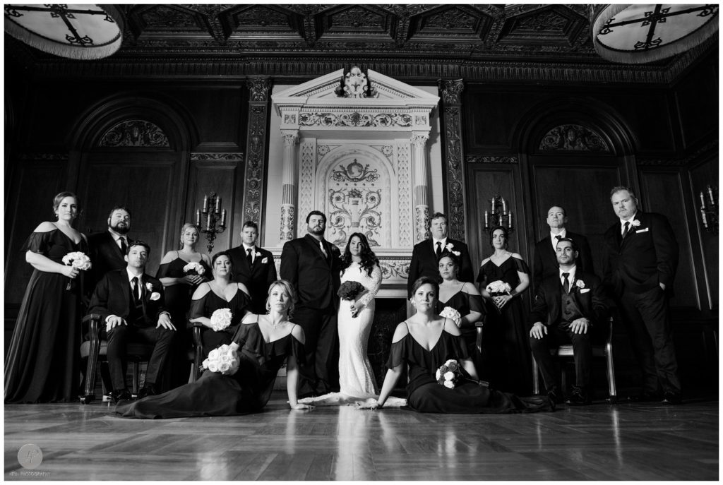 dramatic black and white photo of bridal party in monmouth university