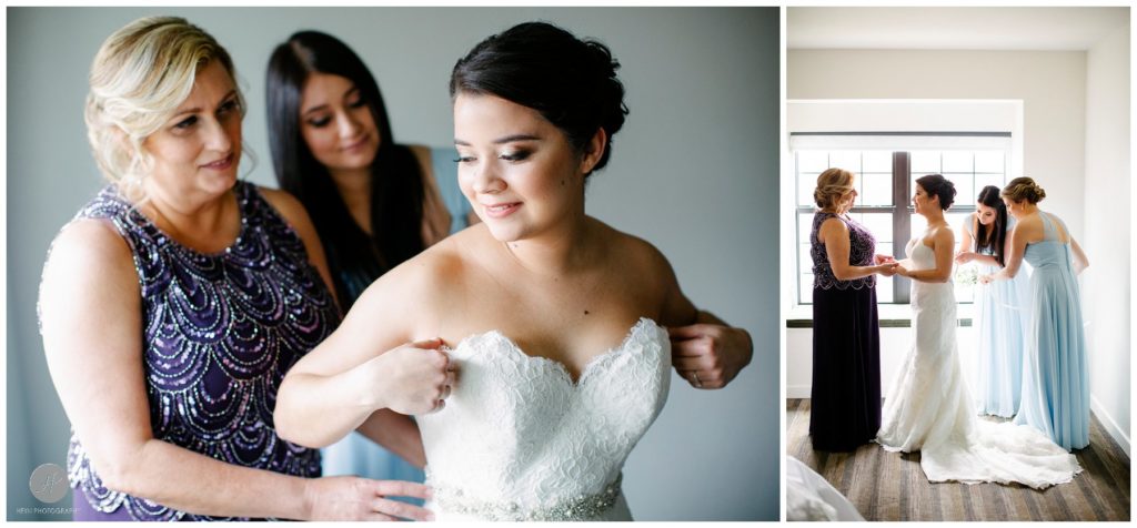mother and maid of honor helping bride get dressed
