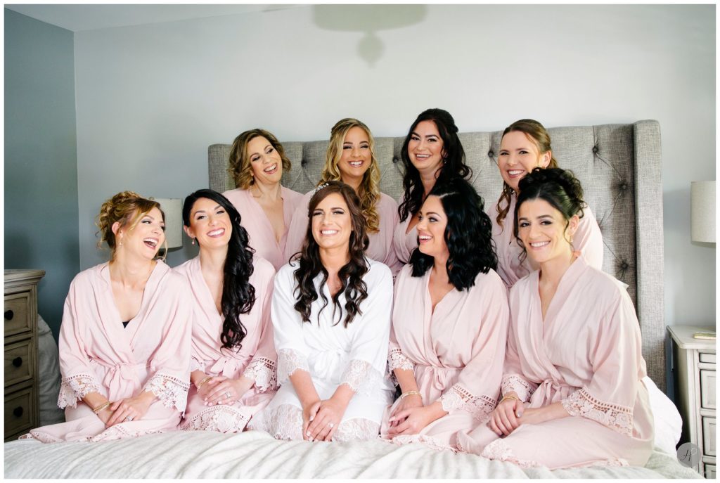 bridal party robe shot on bed