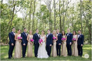 bridal party in navy and gold at allaire state park