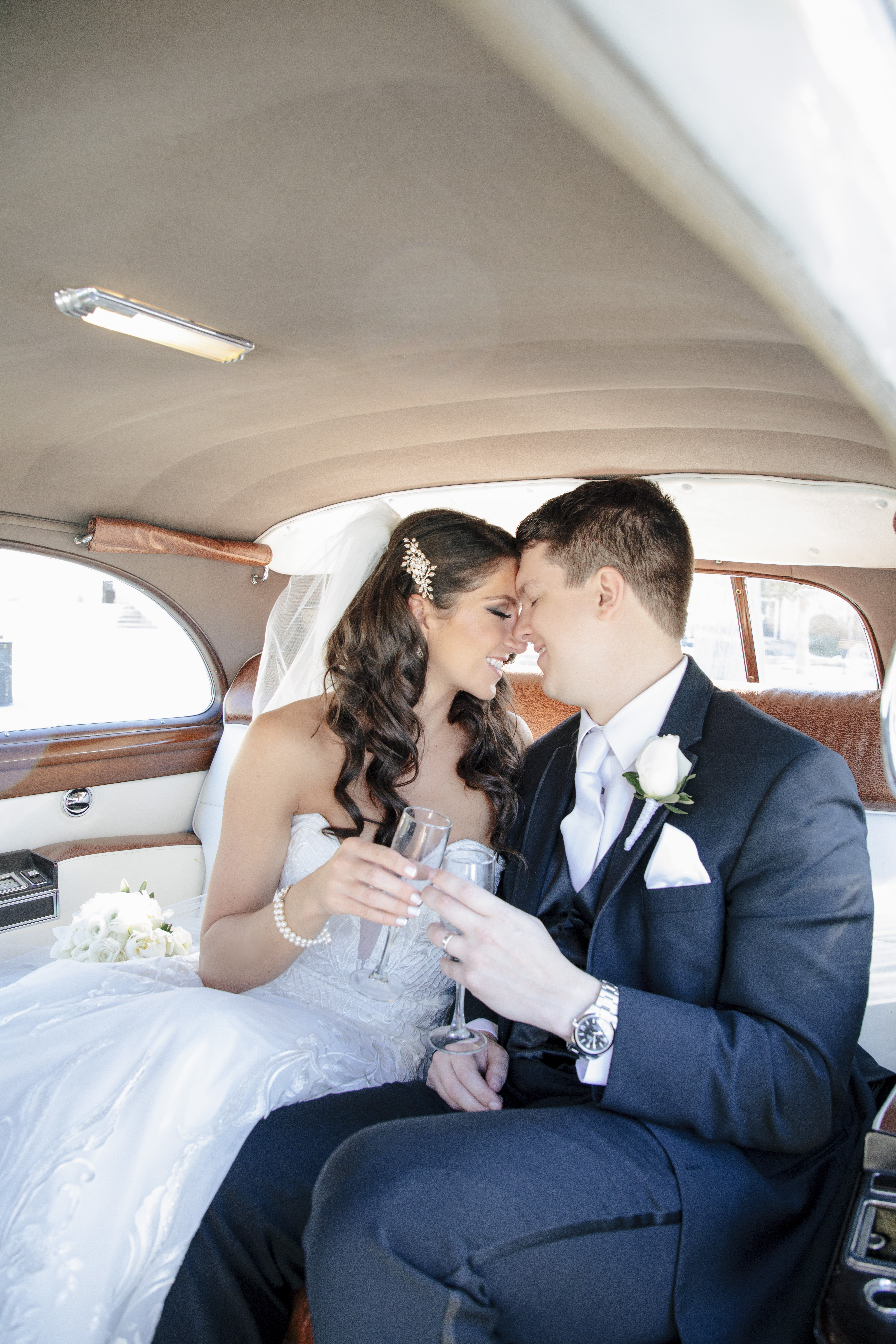 bride and groom in rolls royce at clarks landing yacht club wedding in point pleasant