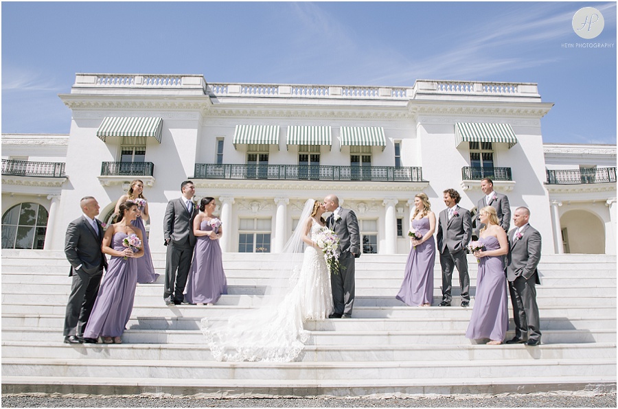 bridal party on steps outside Monmouth University Library wedding 