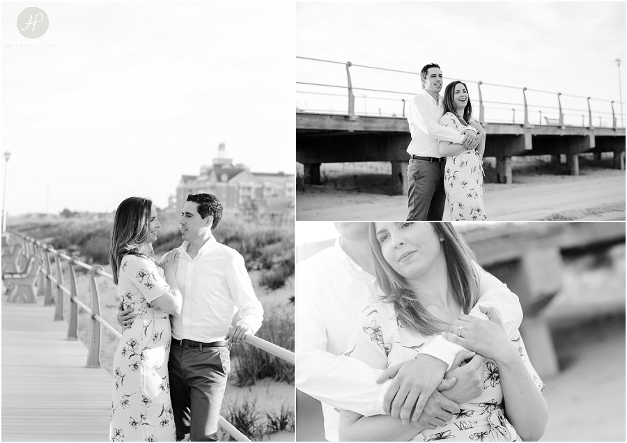 black and white of couple on beach at spring lake engagement session in new jersey 