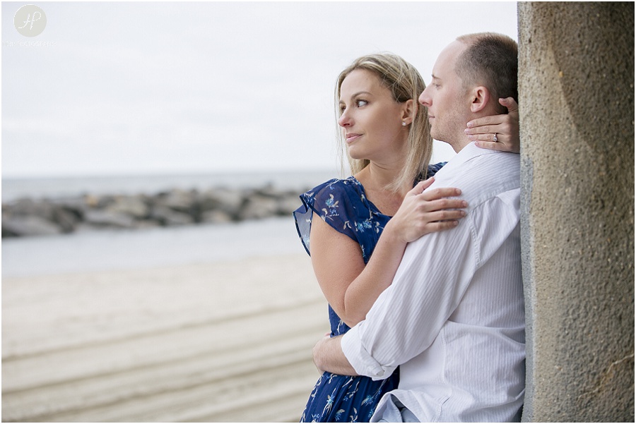  couple on beach in Asbury Park engagement session jersey shore 